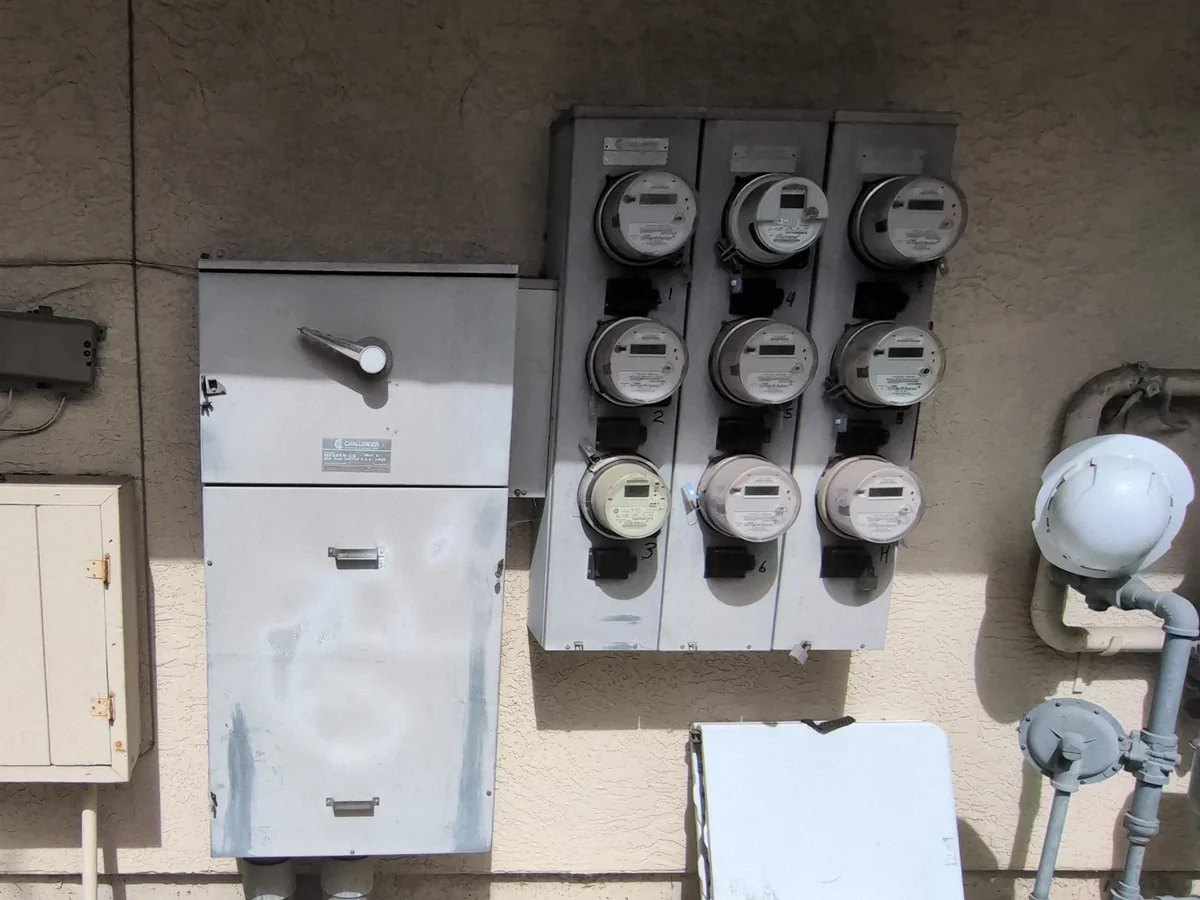 Individual tenant electricity meters beside service equipment